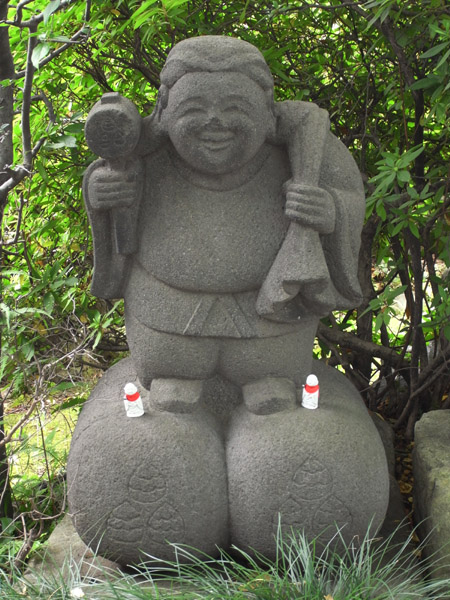 啧